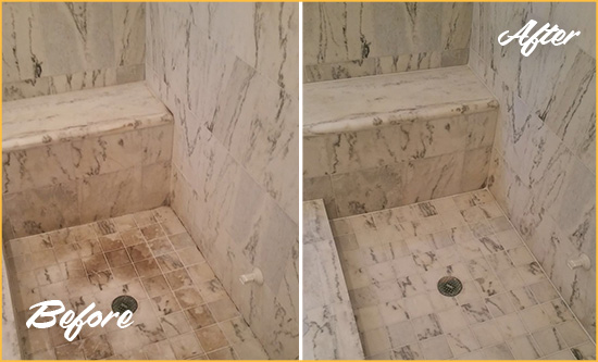 Before and After Picture of a Pawleys Island Marble Shower Honed to Remove Dark Stains